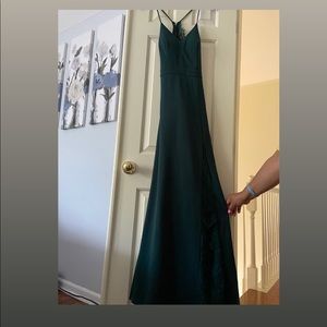 This is a David’s Bridal bridesmaid dress in size 8.